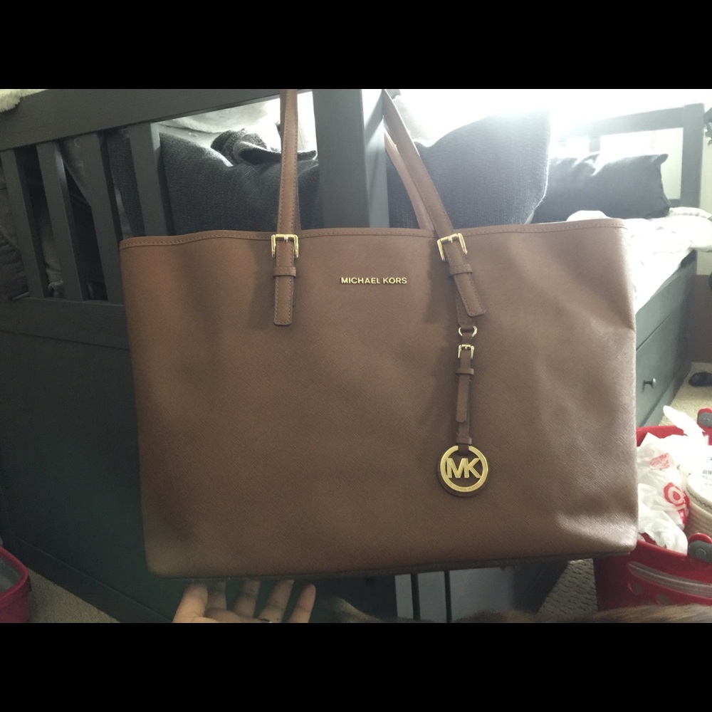 Michael Kors tote luggage, with laptop sleeve